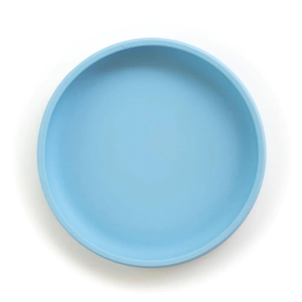 Bright blue silicone suction plate for babies, easy to clean and perfect for mealtime.