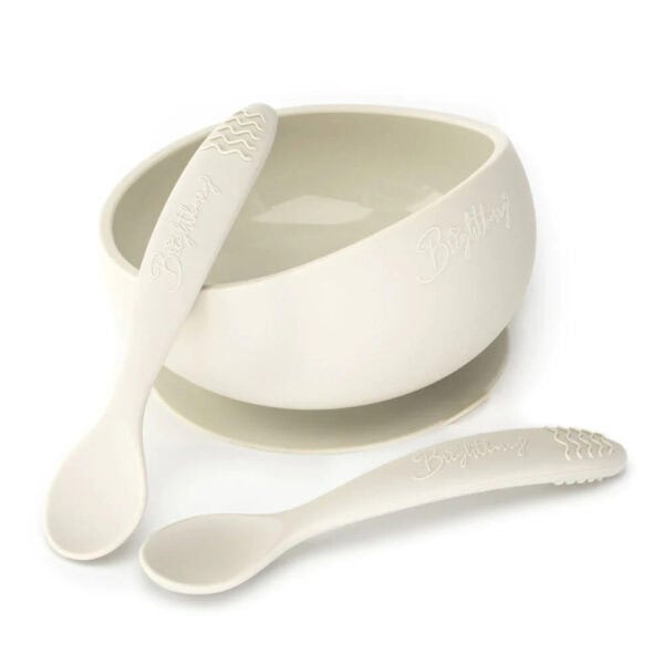 Baby silicone suction bowl with two easy scoop spoons in sand white.