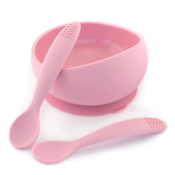 Pink silicone suction bowl with two matching spoons for babies.